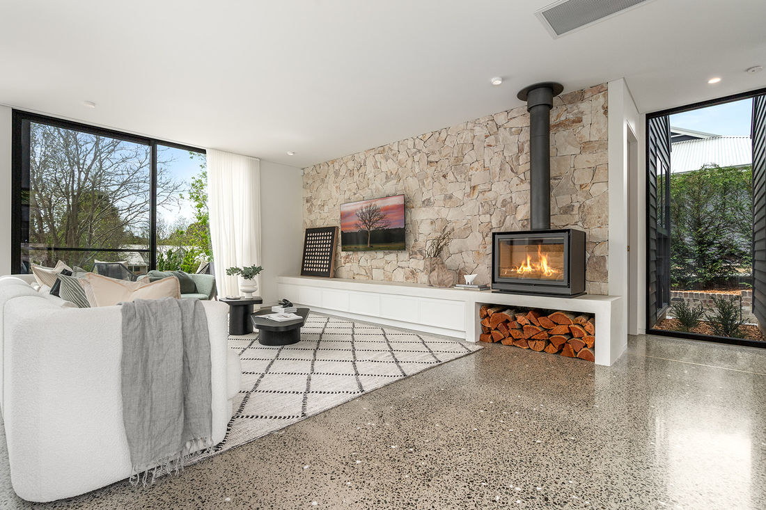 luxurious livability featuring heated polished concrete floors, recycled brickwork, Silvertop Ash external cladding 