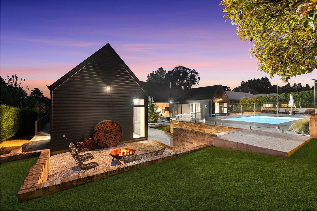 luxurious livability featuring heated polished concrete floors, recycled brickwork, Silvertop Ash external cladding 